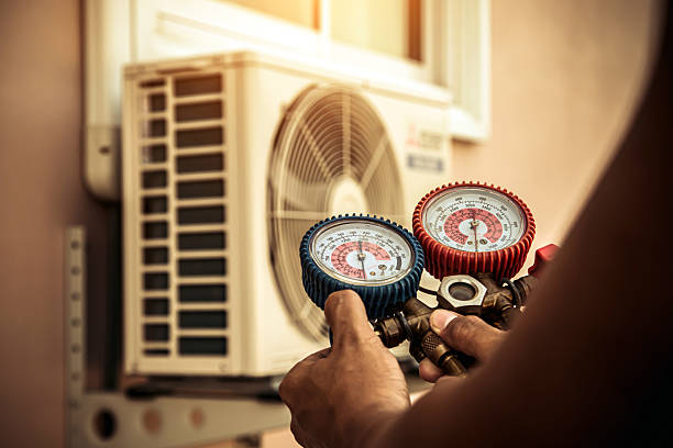 Professional Air Conditioning Service technician working in Greenwood, AR